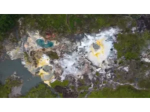 An aerial view of the Deidei geothermal hot springs showing the hot boiling sprouting water