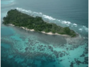 Aerial view of Kaluwana Island, one of the 8 unihabited islands near Sanaroa Island in Milne Bay Province, PNG